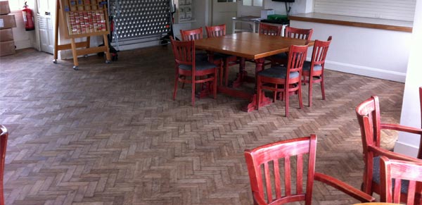 old pub wooden floor before our restoration service