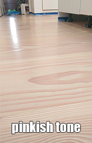 Whitewashed wood floor with pinkish tones