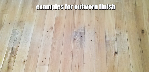 wood flooring with damaged surface and outworn finish